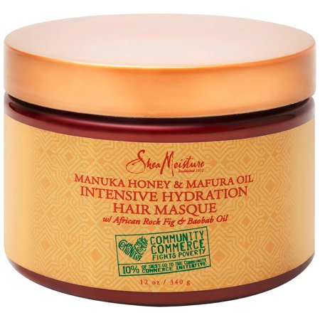 A round, amber-colored jar with a bronze lid, featuring a textured gold label that reads "Shea Moisture Manuka & Mafura Intensive Hydration Masque" and highlights key ingredients.