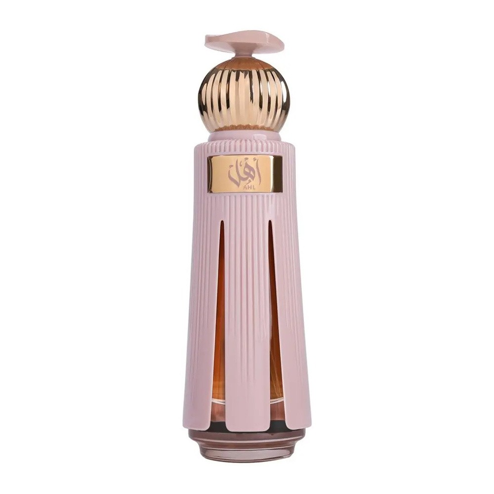 Elegant pink bottle with vertical grooves, topped with a gold dome cap; features a gold label with Arabic script, containing 60 ml of scented extract by Ahmed Al Maghribi.