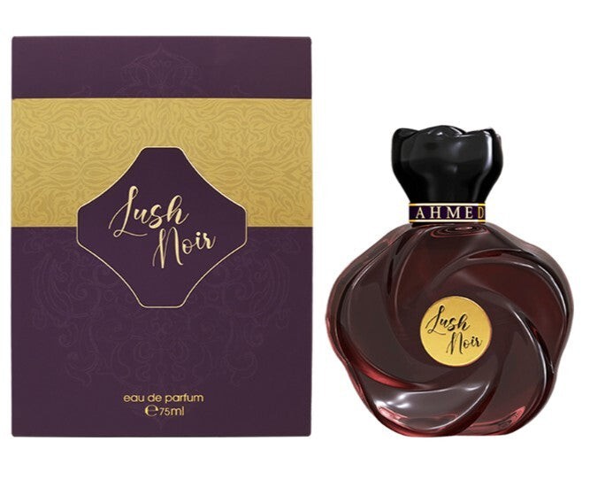 Lush Noir EDP by Ahmed Al Maghribi features a dark, swirled glass bottle with a black cap, accompanied by a rich purple box adorned with gold accents and the brand name.