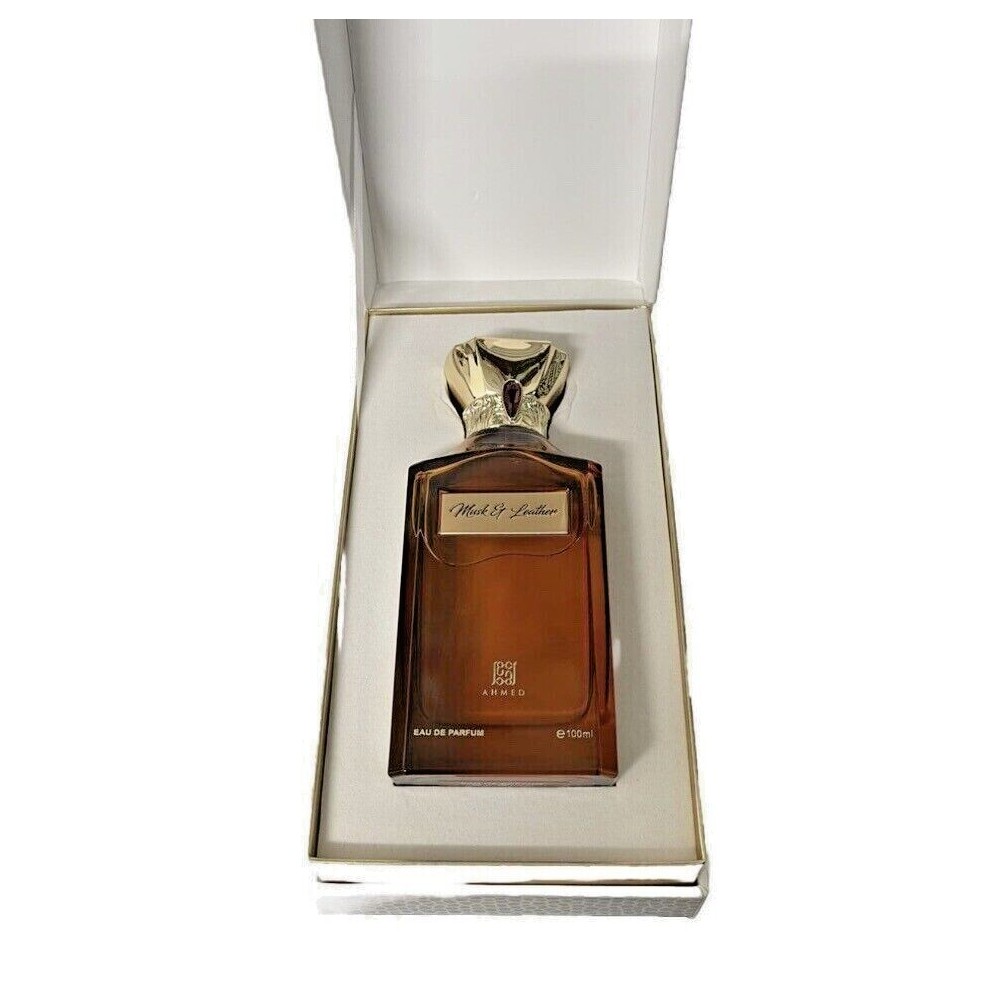Musk and Leather EDP 100ml for men in an elegant glass bottle with a gold cap, presented in a cream-colored box with a soft interior lining.