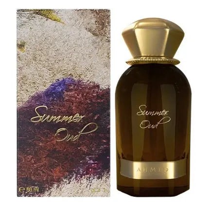 Elegant glass bottle of Ahmed Al Maghribi Summer Oud, featuring a gold cap and a sleek design, alongside a decorative box with rich, textured colors and gold lettering.