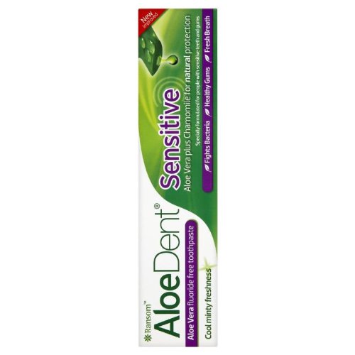 AloeDent Sensitive Fluoride Free Toothpaste tube in a white and green design, featuring aloe vera and chamomile, with text highlighting its benefits for healthy gums and fresh breath.