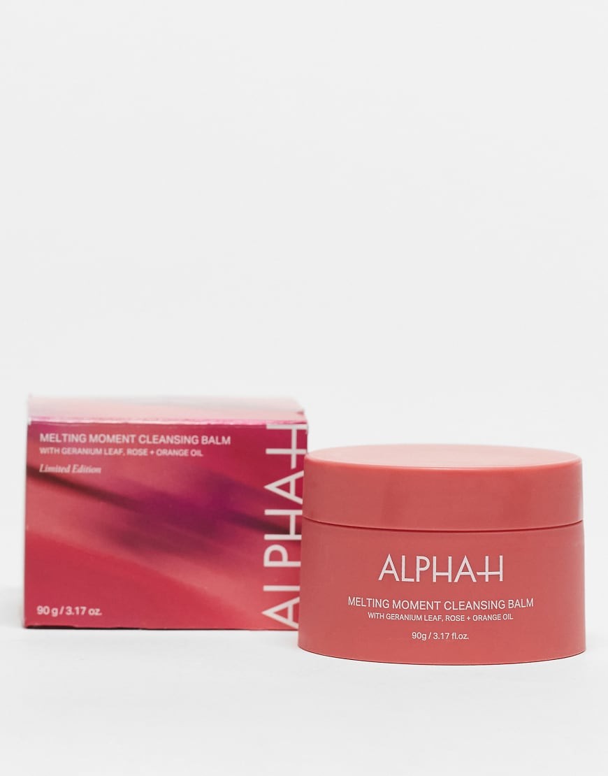 Geranium red cleansing balm in a sleek jar with a matching box, featuring the text "Alpha-H Melting Moment Cleansing Balm" and details about its ingredients and size.