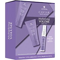 Purple box containing Alterna Caviar Anti-Aging Multiplying Volume Trial Kit, featuring shampoo, conditioner, and styling spray, all in sleek tubes with elegant branding.