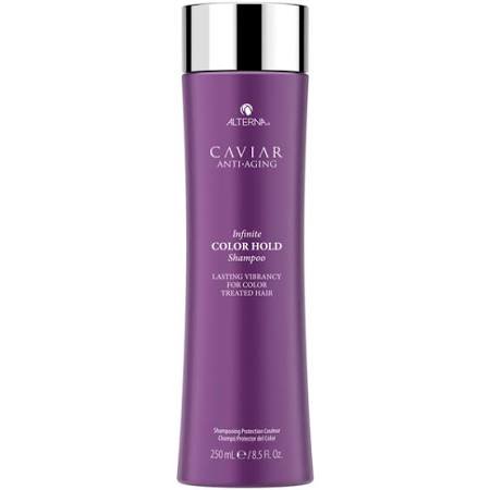 Purple bottle of Caviar Anti-Aging Infinite Color Hold Shampoo by Alterna, featuring a sleek design, 8.5 oz size, and text highlighting its benefits for color-treated hair.
