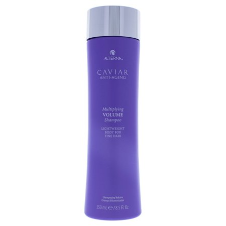 Purple bottle of Alterna Caviar Anti-Aging Multiplying Volume Shampoo, 8.5 oz, featuring a sleek design and silver cap, labeled for fine hair with anti-aging benefits.