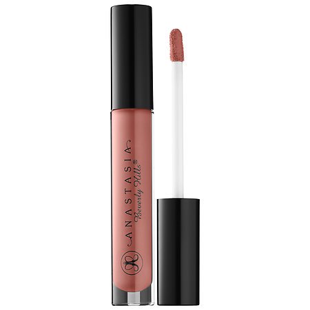 Caramel-colored lip gloss in a clear tube with a black cap, featuring a doe-foot applicator for easy application, branded with "Anastasia Beverly Hills."