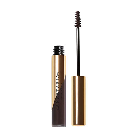 Mini Dipbrow Gel in Ebony by Anastasia Beverly Hills, featuring a sleek gold tube and a black applicator wand with a fine brush for precise eyebrow application.