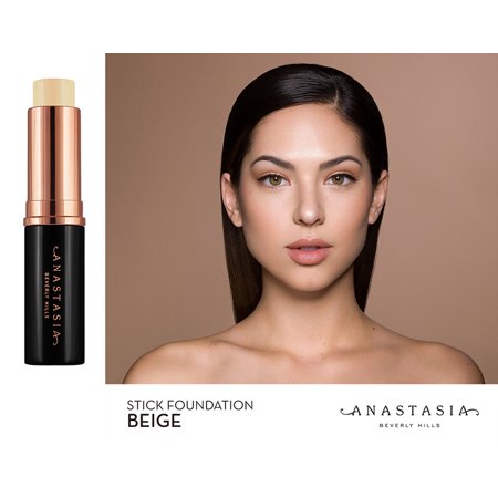 Beige Anastasia Beverly Hills Stick Foundation in a sleek black tube with rose gold accents, featuring a twist-up applicator, displayed alongside a model with natural makeup.