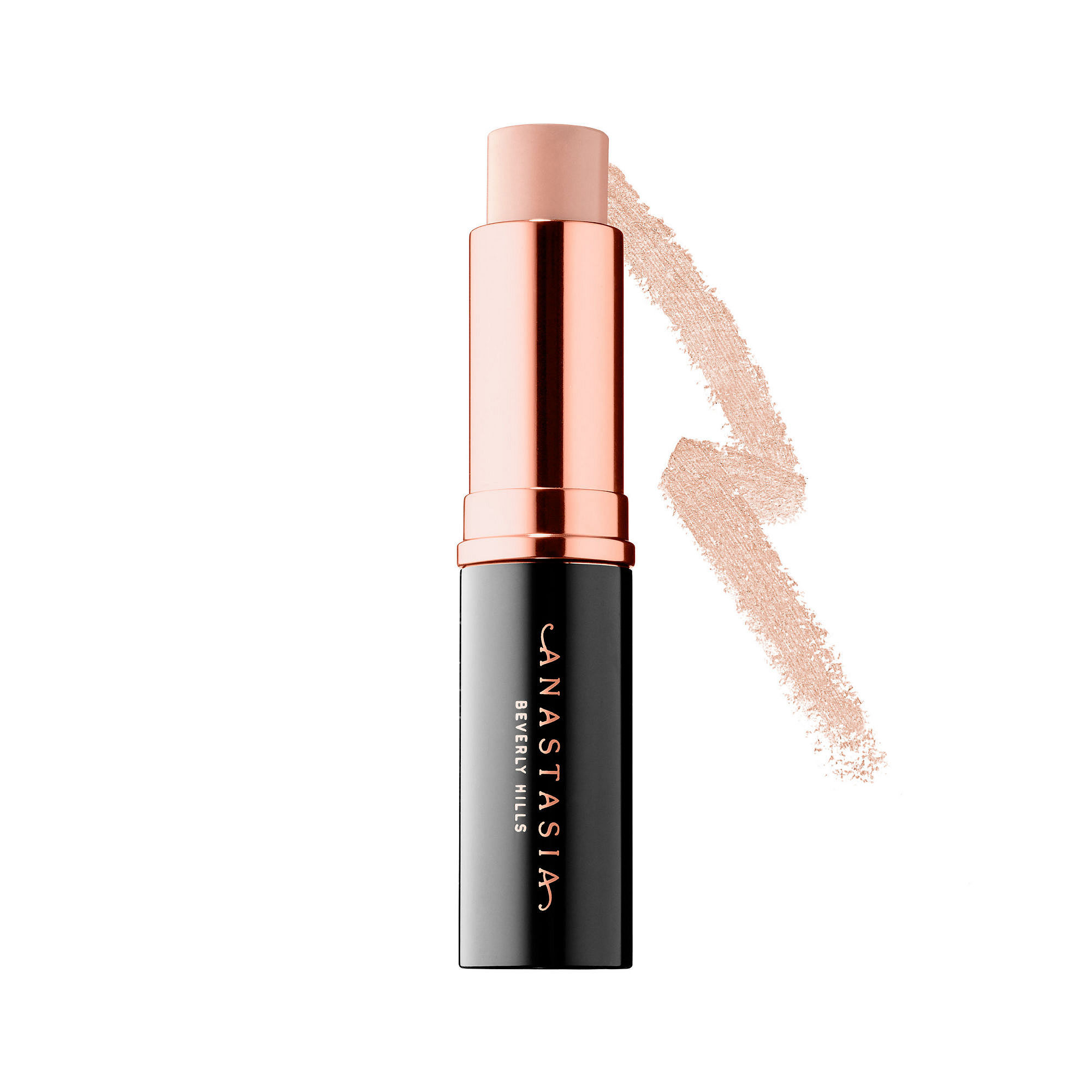 Warm Ivory stick foundation with a sleek black and rose gold tube, featuring a creamy texture and a swatch of foundation beside it.