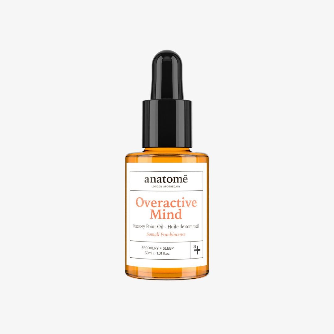 Amber glass bottle with a black dropper lid, labeled "Overactive Mind Sensory Point Oil" in white and orange text, designed for recovery and sleep, 30ml size.
