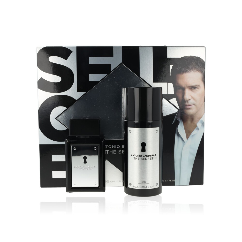 Black and silver gift set featuring a 50ml EDT bottle and a 150ml deodorant spray, with a sleek design and a backdrop of a promotional image of Antonio Banderas.