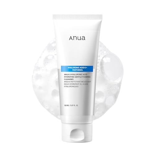White tube of Anua Gentle Moisturizing Foaming Cleanser, featuring blue accents, labeled with "Hyaluronic Acid" and "150 ml," set against a soft, bubbly background.