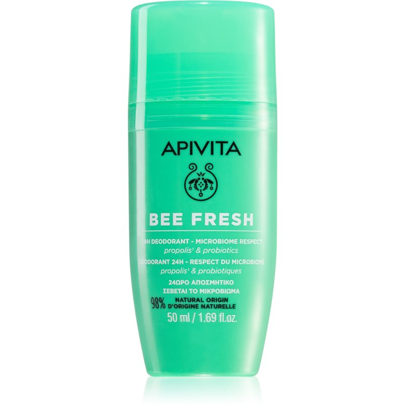 Green roll-on deodorant bottle with a smooth, curved design, featuring the label "APIVITA BEE FRESH" and details about its natural ingredients and probiotic properties.
