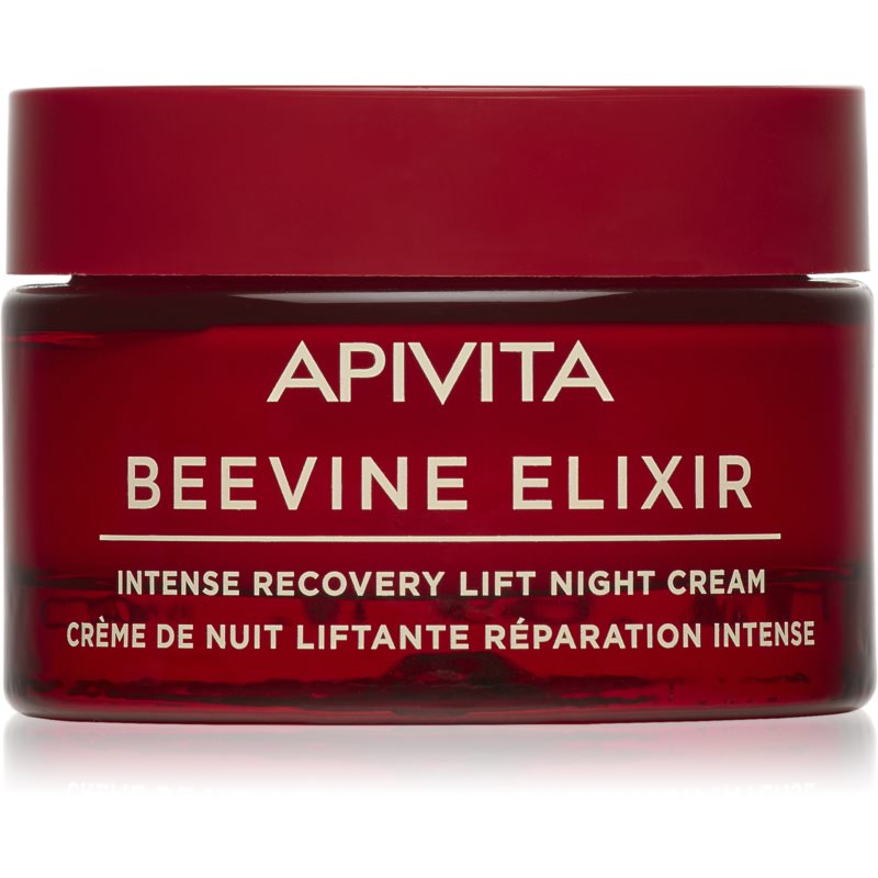 Red glass jar with a glossy finish, labeled "APIVITA BEEVINE ELIXIR," featuring white text that reads "INTENSE RECOVERY LIFT NIGHT CREAM" in both English and French.