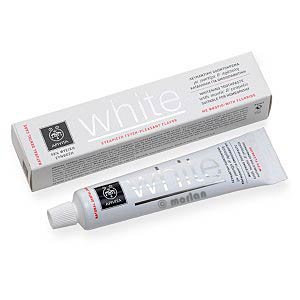 White toothpaste tube with a flip-top cap, featuring a sleek design and the word "white" prominently displayed; accompanied by a matching grey and white box.