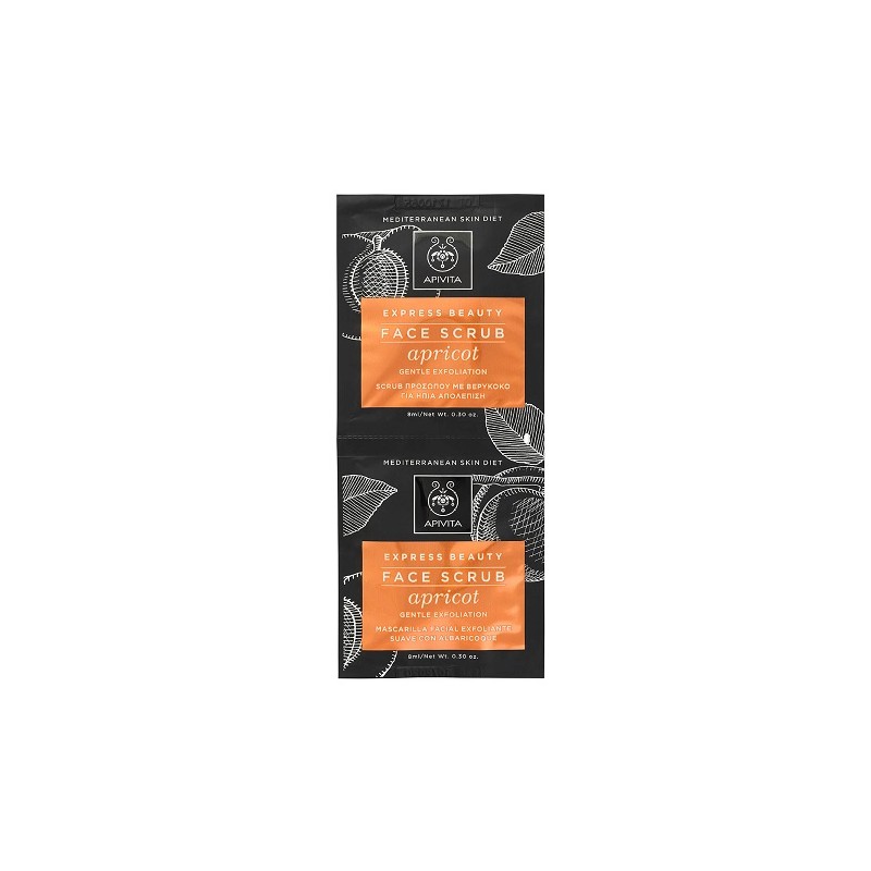 Two sachets of Apivita Express Beauty Apricot Face Scrub Mask, featuring an orange label with white text, set against a black background adorned with leaf patterns.