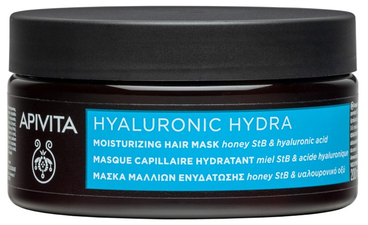 Dark brown jar with a black lid, labeled "APIVITA HYALURONIC HYDRA," featuring moisturizing hair mask details, highlighting honey and hyaluronic acid as key ingredients.