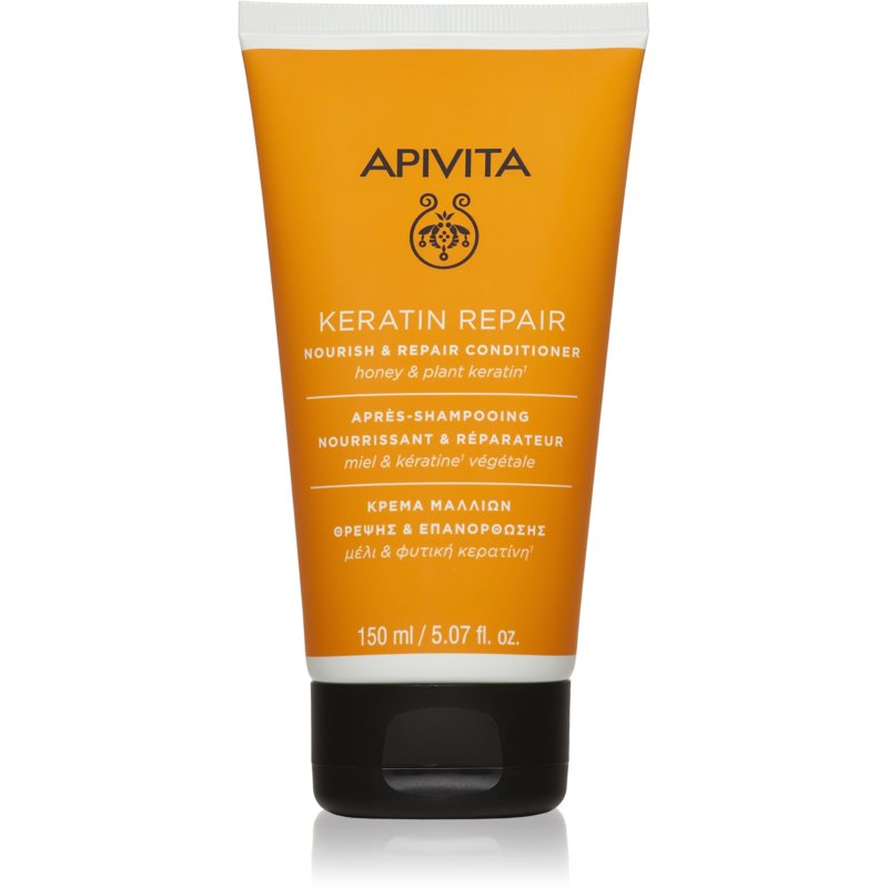 Orange tube of Apivita Keratin Repair Conditioner, 150ml, featuring a flip-top cap, with text highlighting nourishing and repairing properties for dry and damaged hair.