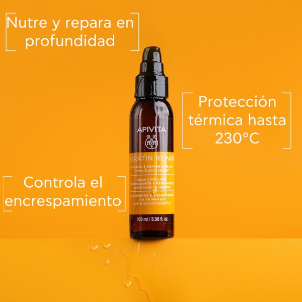 Keratin Repair Nourishing Hair Oil in a sleek, dark glass bottle with a black pump, featuring an orange background and white text highlighting its benefits.