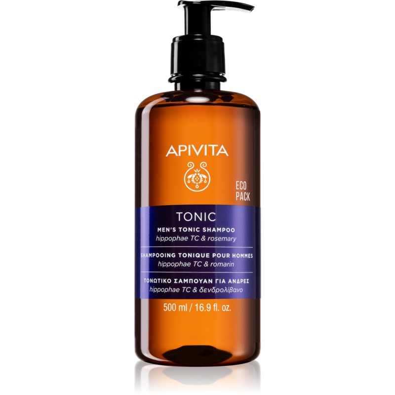 Amber-colored bottle with a black pump, labeled "APIVITA" in white, featuring a blue band with product details, containing 500 ml of anti-hair loss shampoo with hippophae and rosemary.