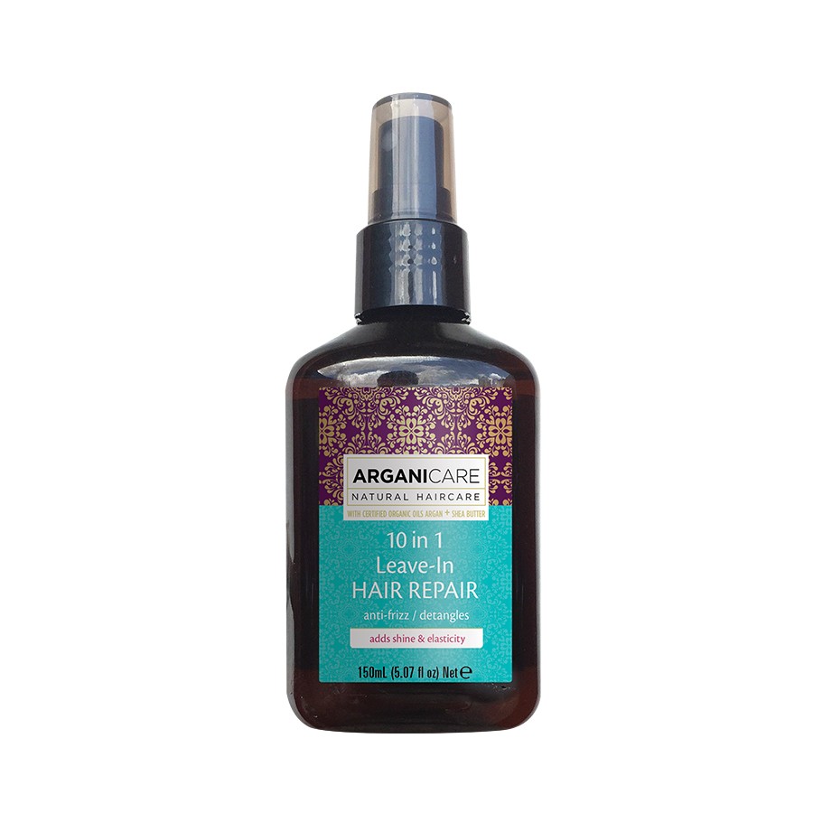 Dark amber spray bottle with a black pump top, featuring a colorful label that highlights "10 in 1 Leave-In Hair Repair" and "Argan Oil," 150 ml size.