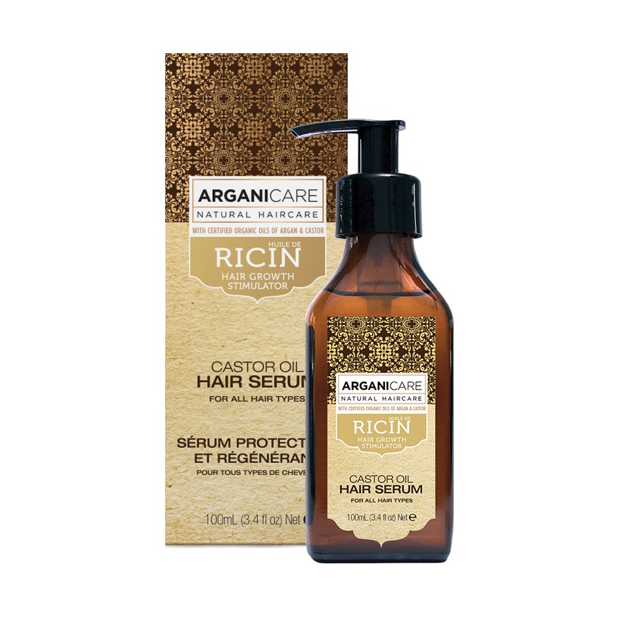 Brown glass bottle with a black pump dispenser, labeled "ARGANICARE Ricino Protective Serum 100ml," featuring a gold and white design, packaged in a matching box.