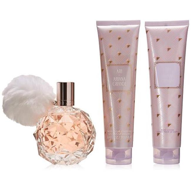 Three-piece gift set featuring a diamond-shaped pink perfume bottle with a fluffy white pom-pom, and two matching pink tubes adorned with gold geometric patterns.