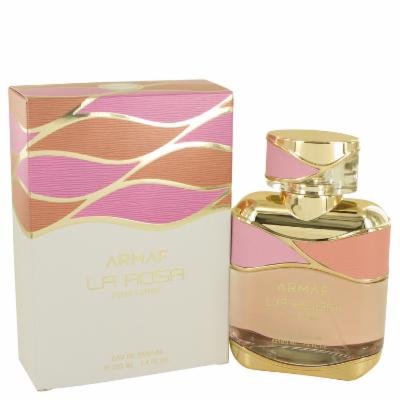 Clear glass perfume bottle with a pink and gold cap, featuring a wavy design; accompanied by a matching pink and gold box, labeled "Armaf La Rosa EDP Spray."