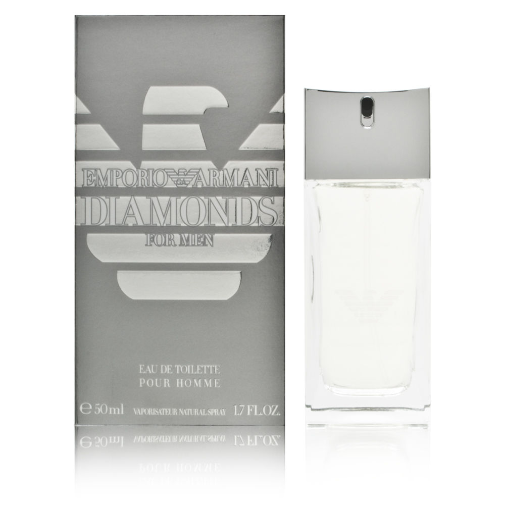 Clear glass bottle with a sleek, rectangular design, topped with a silver cap, alongside a silver and white box featuring the Emporio Armani logo and "Diamonds" text.