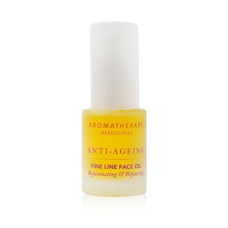 Clear glass bottle with a white cap, containing yellow face oil, labeled "Aromatherapy Associates Anti-Ageing Fine Line Face Oil" with text highlighting its rejuvenating properties.