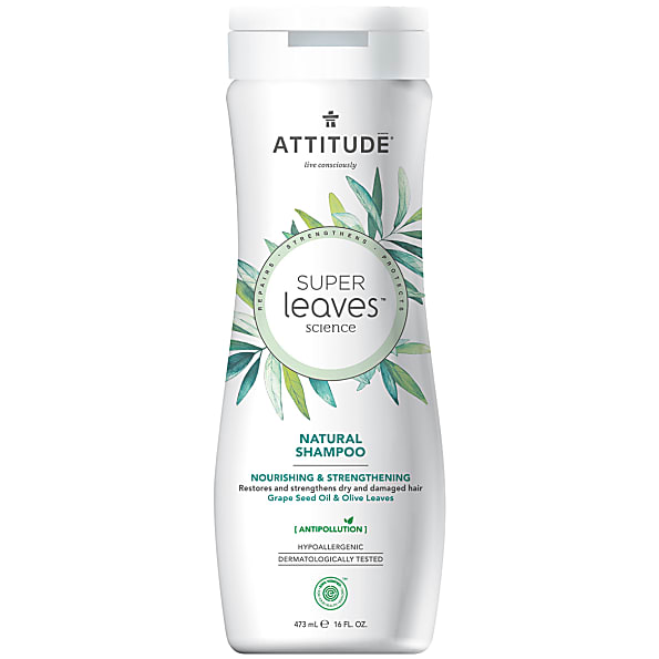 White bottle with green leaf illustrations, labeled "Attitude Super Leaves Natural Shampoo - Nourishing & Strengthening," featuring a flip-top cap and 473 ml capacity.