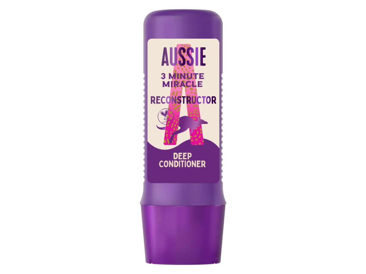 Purple plastic tube of Aussie 3 Minute Miracle Reconstructor deep conditioner, featuring a label with pink text and a kangaroo graphic.