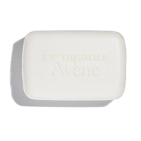 White rectangular cleansing bar with a smooth surface, embossed with "Eau Thermale Avène," designed for dry to very dry sensitive skin.