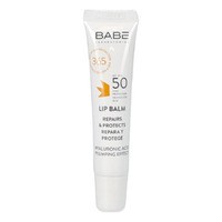 White tube with a silver cap, featuring the Babe logo and SPF 50 label, designed for lip care, emphasizing repair and protection with hyaluronic acid.