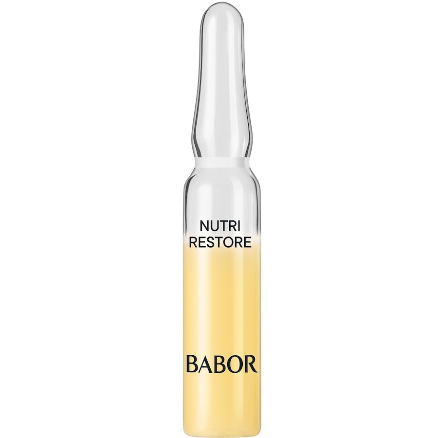 Clear glass ampoule containing a golden-yellow liquid, labeled "NUTRI RESTORE" in black text, with "BABOR" printed prominently at the bottom.