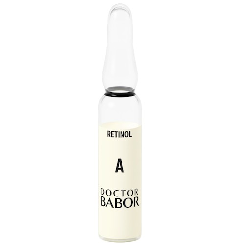 Clear glass ampoule containing a pale yellow serum labeled "Retinol A" and "Doctor Babor," featuring a black band at the neck and a pointed top for easy opening.