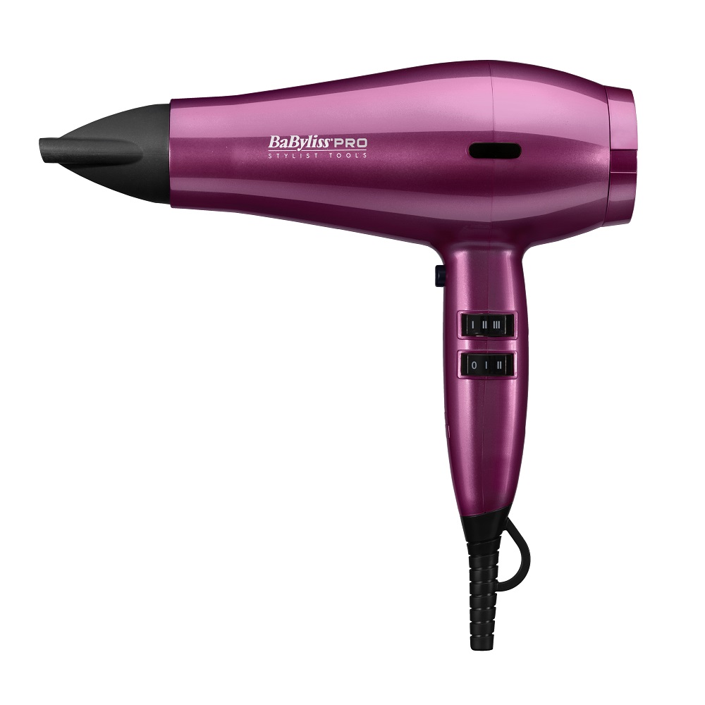 BaByliss PRO BAB6738 PU Spectrum Hair Dryer in pink shimmer finish, featuring a sleek design, black nozzle, and two control switches on the handle.