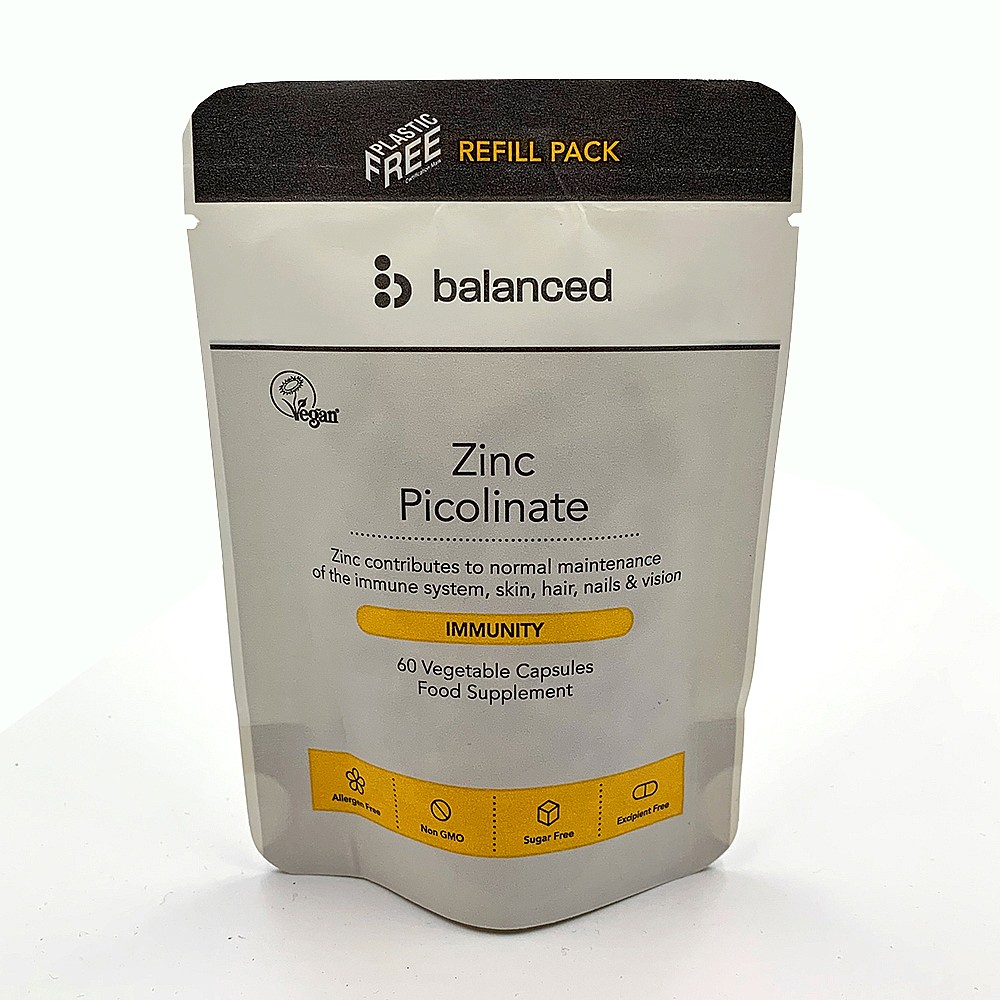 Balanced Zinc Picolinate refill pouch in a silver and white design, featuring a black top, labeled "60 Vegetable Capsules" and highlighting benefits for immunity, vegan, and non-GMO.
