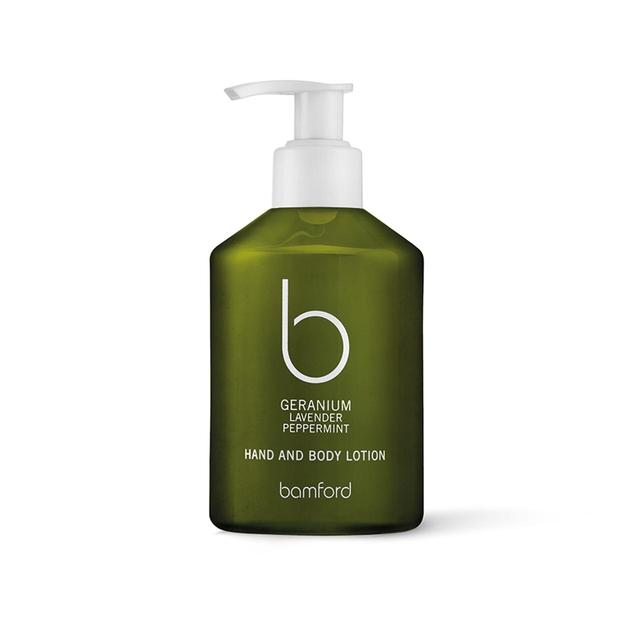 Green plastic bottle with a pump dispenser, labeled "Geranium Lavender Peppermint Hand and Body Wash" by Bamford, featuring a simple white logo and text on the front.