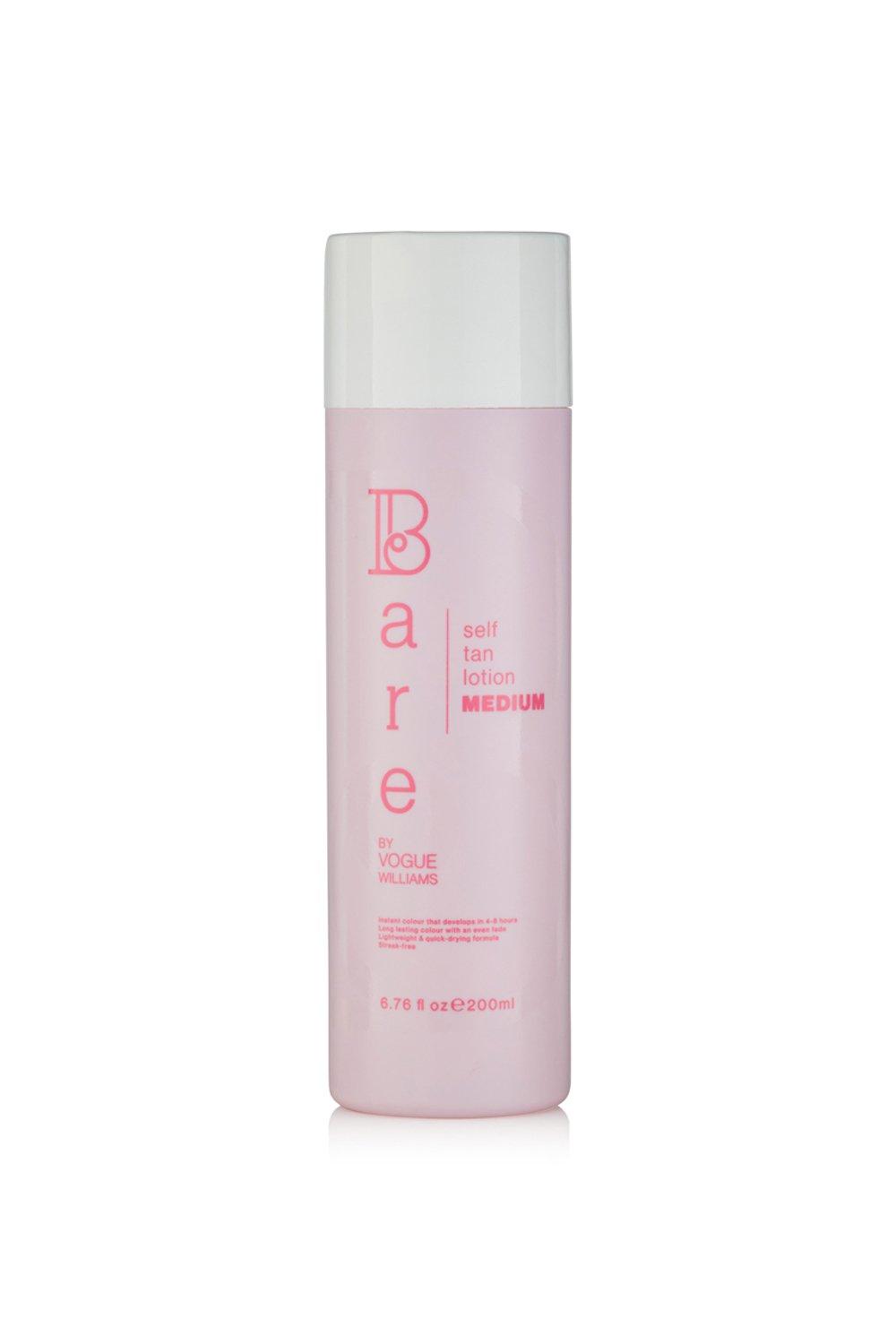 Light pink bottle of Debenhams Self Tan Lotion in Medium, 200ml, featuring bold white and pink text, with a sleek, smooth plastic design and a white cap.