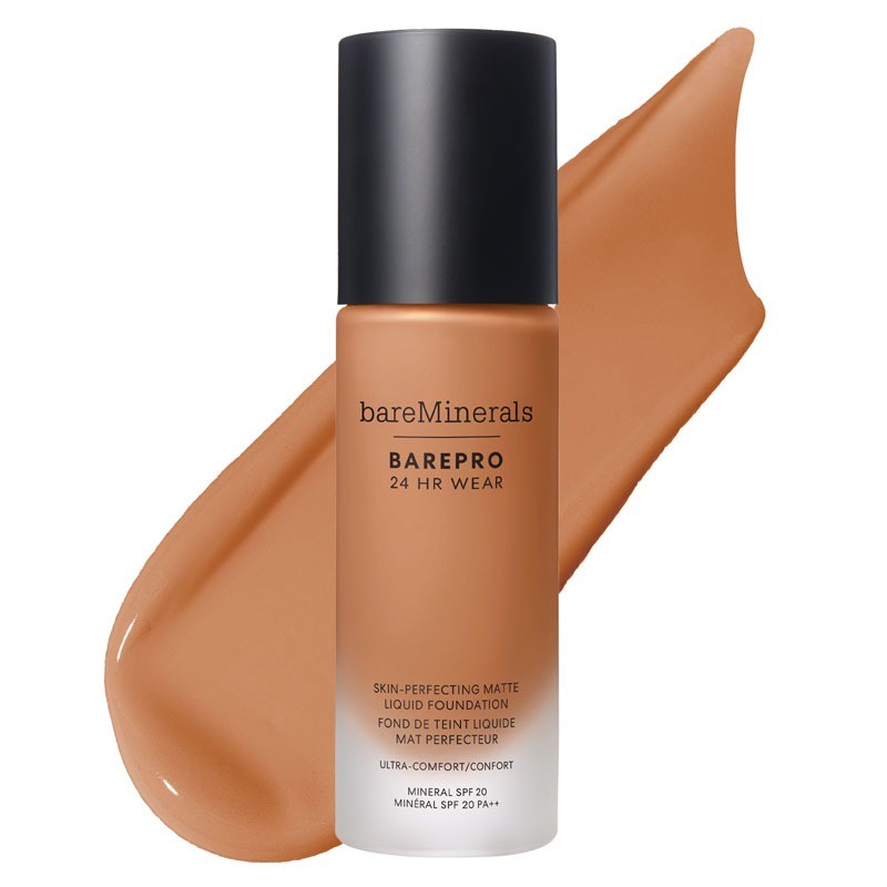 Matte liquid foundation in a sleek glass bottle with a black cap, labeled "bareMinerals Barepro 24 Hour Hold SPF 20 Fair 10," alongside a swatch of warm beige foundation.