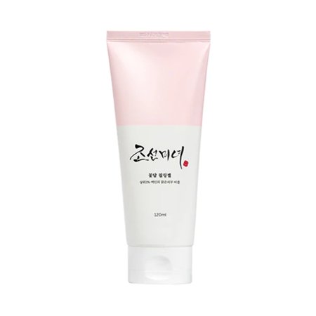 A pale pink tube with a white cap, featuring Korean text and a small red dot, labeled "Beauty of Joseon Apricot Blossom Peeling Gel," 3.38 Fl Oz (100 Ml).