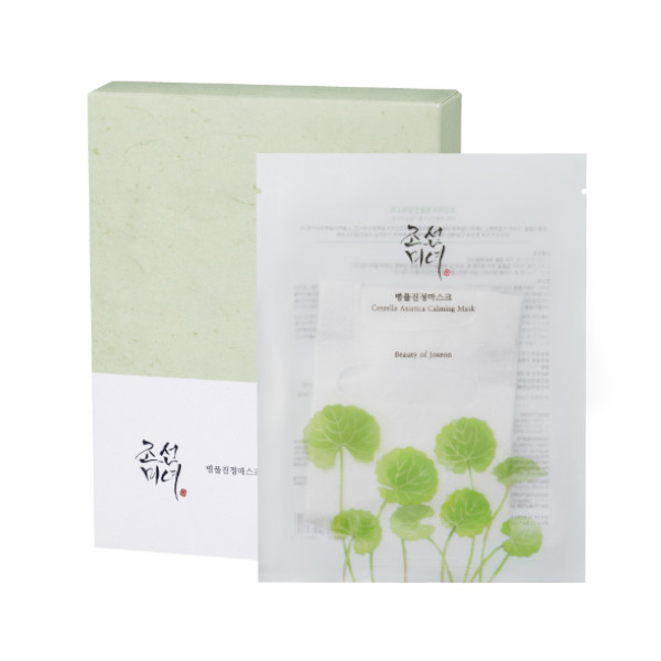 A light green box featuring a floral design, containing ten individually packaged Centella Asiatica calming masks by Beauty of Joseon, with Korean text on the front.