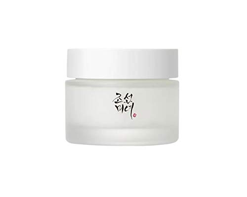 Frosted glass jar with a white lid, labeled "Beauty of Joseon" in black and red text, containing 50ml of cream, showcasing a minimalist and elegant design.