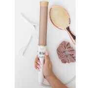 Beauty Works Flat Iron Curl Bar in a sleek white and gold design, featuring a 38mm barrel, digital temperature display, and a textured grip, alongside a hairbrush and scrunchie.