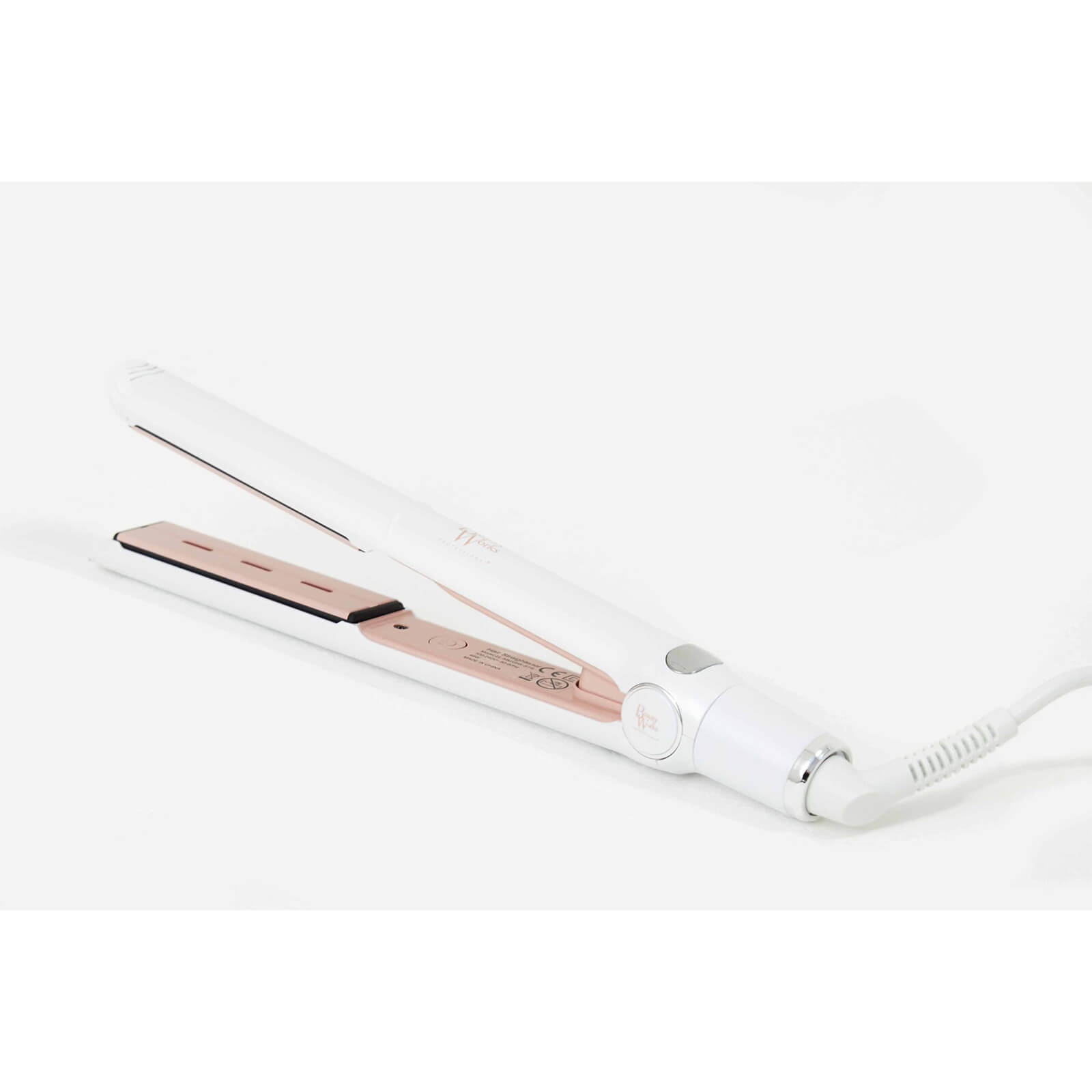 White straightener with rose gold accents, featuring a sleek design, digital temperature display, and a swivel cord for easy styling.
