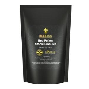 Black resealable pouch containing Bee & You Bee Pollen Whole Granules, labeled with yellow and white text, featuring a honeycomb pattern and a logo with a bee icon.