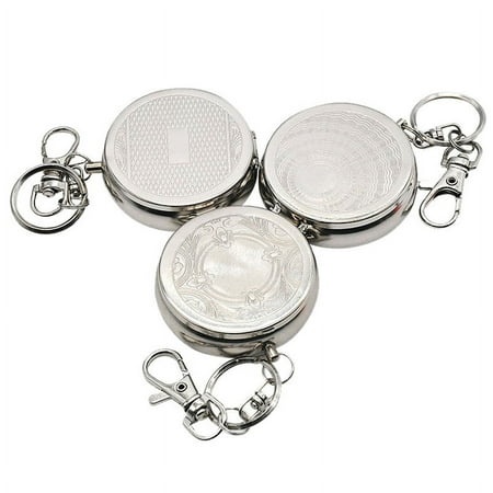 Three shiny, circular metal keychains with intricate designs on their surfaces, each featuring a sturdy clasp for attachment.