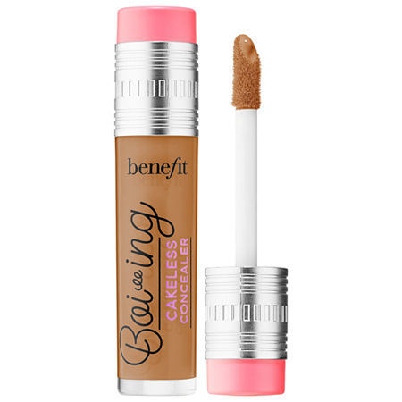 Benefit Cosmetics Boi-Ing Cakeless Concealer in On Point (Tan Warm) features a sleek, clear tube with a silver cap and a soft applicator wand, showcasing a warm tan shade.